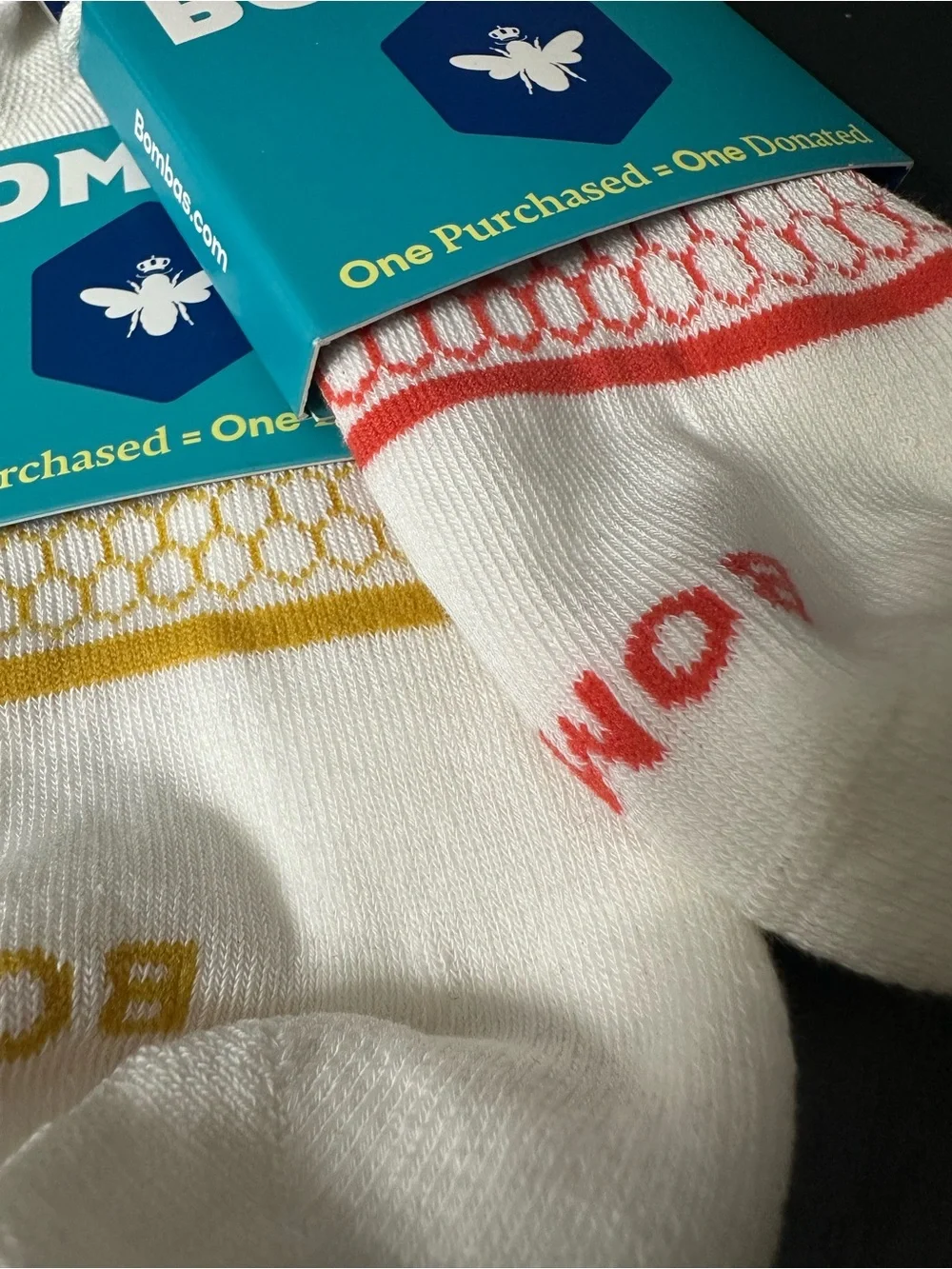 Bombas Women’s White Ankle Socks with Red & Yellow Accents
